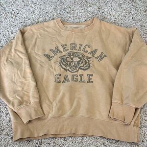 women's American Eagle comfy tan sweatshirt with tiger logo XS